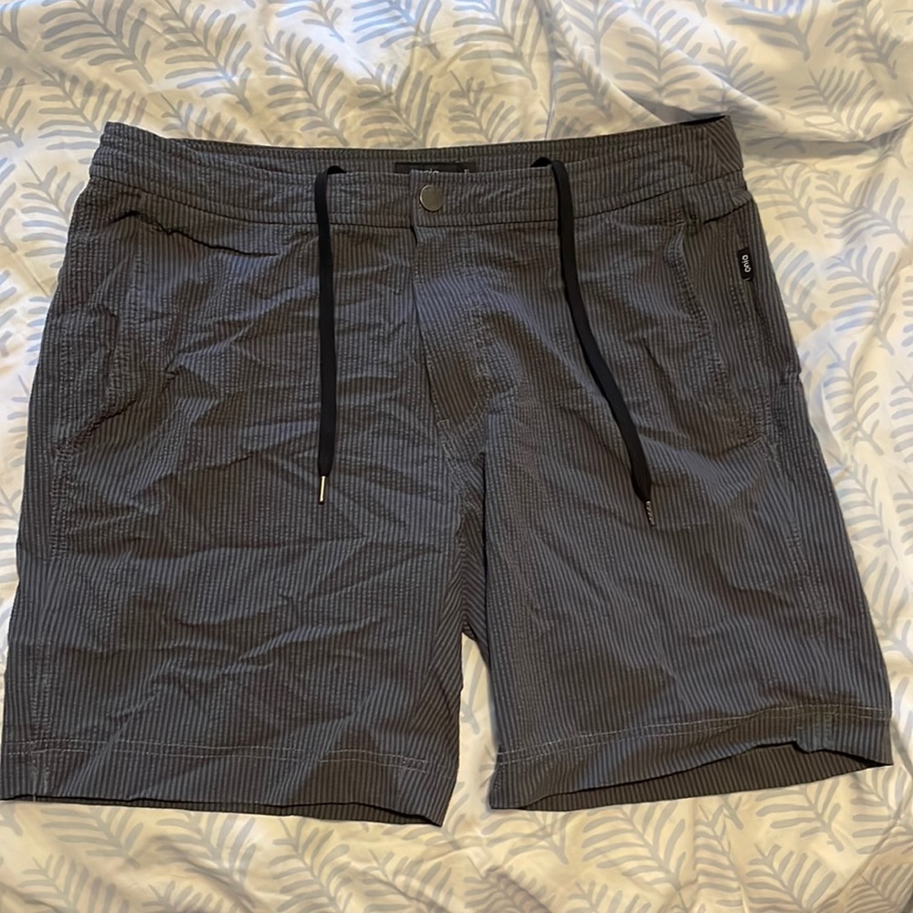 Men’s Onia swim trunk. Grey stripes with a 31” waist